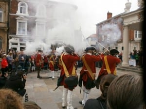 Soldiers firing muskets