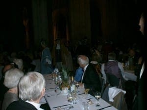 Table with pineapple of hospitality and dancers
